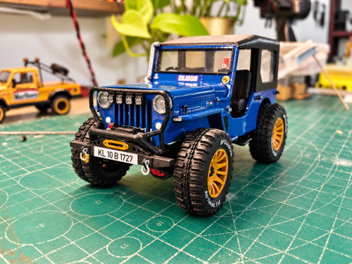 Blue-Vintage-Jeep-on-a-Hobby-Workbench