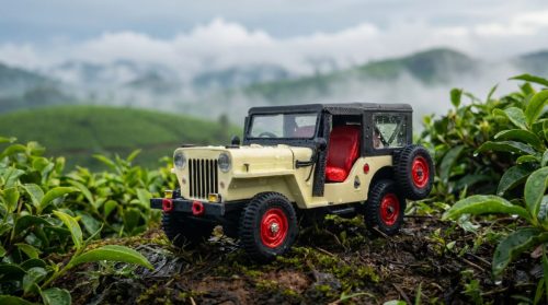 gemini-image-2 ultra realistic macro photo of a resin 3d printed miniature Mahindra jeep refera-0